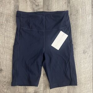 Athleta Ultimate Stash Pocket 9" Short Navy Blue Biker Shorts Women's M NEW